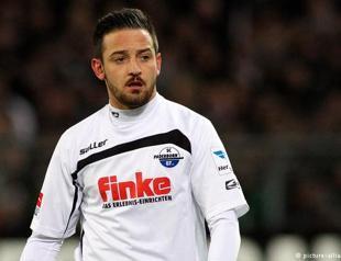 Germany investigates shots fired at German-Turkish football player’s car