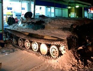 Russian man rams armored personnel carrier into shop, steals wine