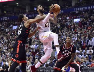 High-flying Raptors blowout Cavaliers