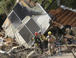 Twenty now dead in California mudslides, major highway closed