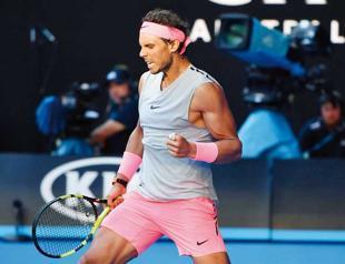 Nadal dominant as Wozniacki pulls off great escape