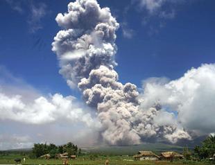 Philippine volcano explodes, authorities raise alert level