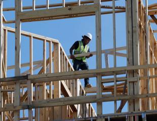 US economy grew 2.6 percent in fourth quarter