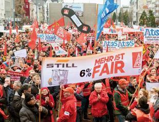 German workers to stage 24-hour strikes