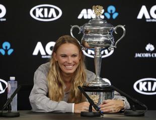 Hugs all round as Wozniacki returns from wilderness