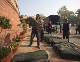 India budget offers free cooking gas, health plan for poor