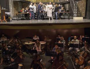 Donizetti’s ‘Elixir of Love’ opera adapted to office life