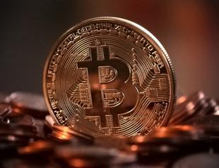 Bitcoin slides below $6,000; half its value lost in 2018