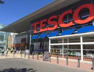 Tesco supermarket warns on profit as inflation bites