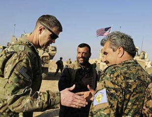 US general says troops will remain in Manbij, backs Kurdish group