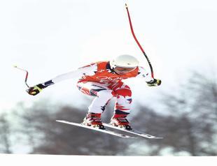 Men’s downhill under wind threat