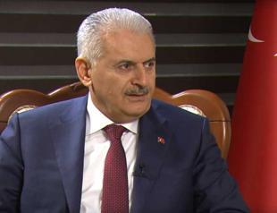 I hope German journalist Deniz Yücel will be released soon: Turkish PM