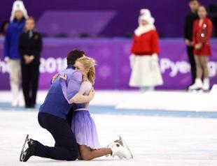 Savchenko, Massot win emotional gold