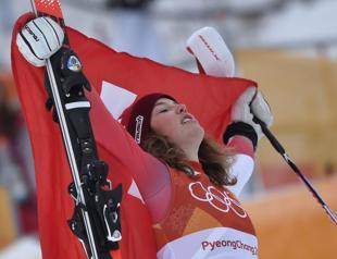 Gisin holds off Shiffrin to claim combined gold