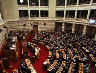Greek MPs decide on probe into bribery claim