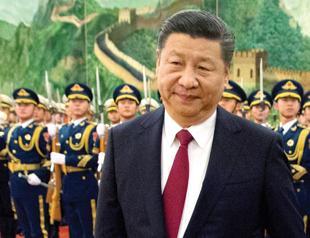 China slams critics of lifetime presidency