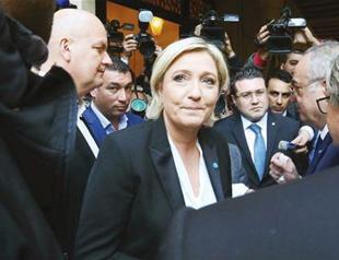 France’s Marine Le Pen charged over Islamic State tweets
