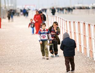 Turkey calls on EU to honor its part of key 2016 migrant deal