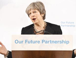 Britain’s May sets out vision for frictionless trade after Brexit