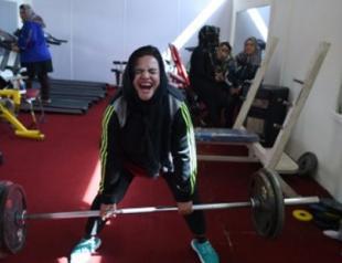 Afghan female powerlifters flex muscles for medals and beyond