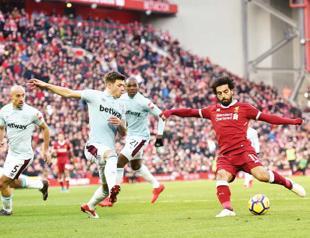 Manchester bids to keep Liverpool at bay
