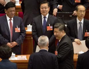 China reshapes economic team to battle trade tensions, debt pile