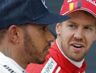 Hamilton, Vettel kick off race for fifth title in Melbourne