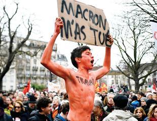 France’s president sees popularity hit record low -poll