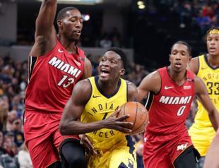 Pacers pull away late to clinch playoff spot