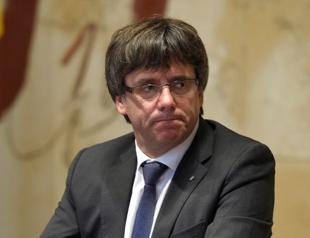 Puigdemont in German court as arrest ignites Catalan protests