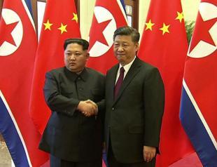 N Korea’s Kim shows unity with China’s Xi in first foreign trip