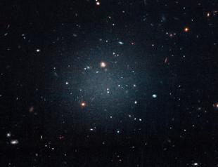 Scientists puzzled by exotic distant galaxy lacking dark matter