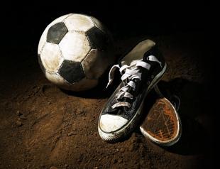Child footballers ‘offered boots for sex work’
