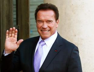 Schwarzenegger wakes from heart surgery declaring: Im back