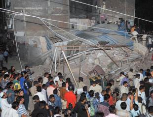 Ten dead as building struck by car collapses in India