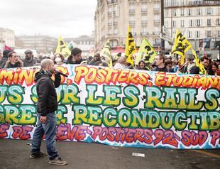 French rail workers begin months of strikes in test for Macron