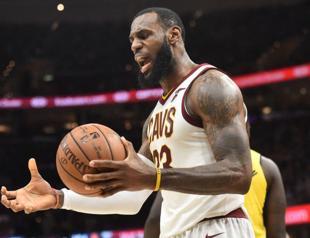 LeBron milestone as Cavs wobble Raptors