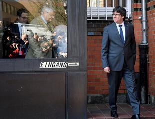 Puigdemont urges dialogue with Madrid after leaving German jail