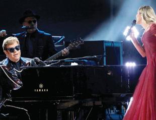 Pop, country singers reimagine Elton John hits on two albums