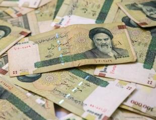 Iran unifies official and open market exchange rates as rial hit new low