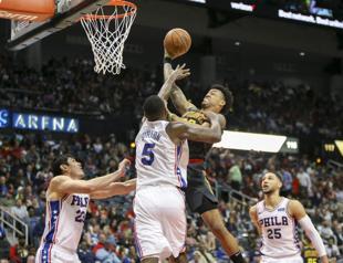76ers win 15th straight victory, holding off Hawks