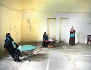 Afghans register to vote in long-delayed elections amid violence