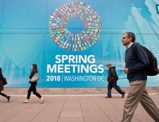 IMF sees solid near-term global growth but risks beyond