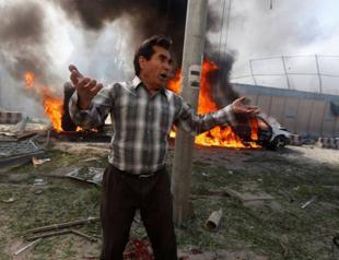 Suicide attack on Kabul election center kills at least 52