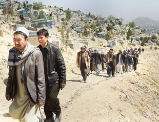 Taliban attacks kill 14 troops, policemen