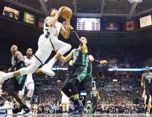 Milwaukee edge Boston to level series