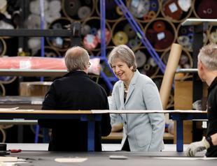 Britain sticks to plans on EU customs union, government ‘as one’