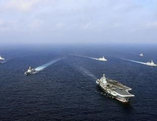 Chinese carrier leads live fire drill in East China Sea