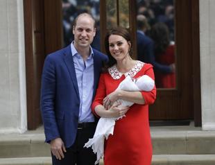 Britains Prince William and Kate return home with newborn son
