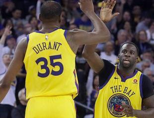 Durant steers Warriors past Spurs, Philadelphia advances